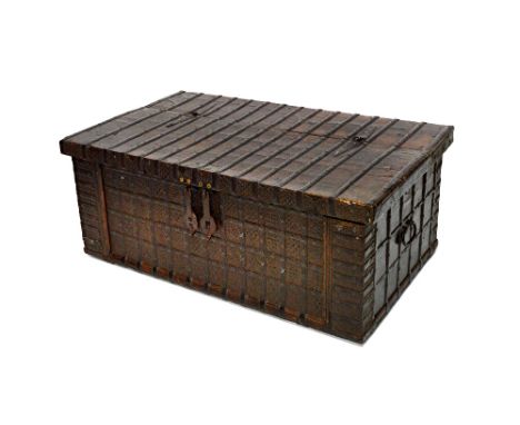 A 19th century Indian teak metal bound rectangular trunk, 126cm wide x 51cm high x 75cm deep.  Illustrated