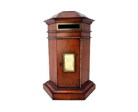 A Victorian style yew wood octagonal table top post box, on plinth base, 23cm wide x 39cm high.  Illustrated