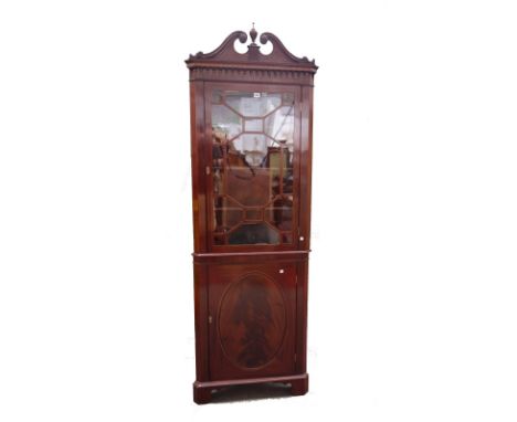 A 19th century inlaid mahogany floor standing corner display cabinet on bracket feet, 72cm wide x 215cm high. 