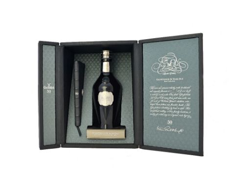 A promotional bottle of Glenfiddich fifty year old single malt Scotch whisky, with silver hallmarked embellishments, in a bla