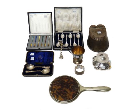 Silver and silver mounted wares, comprising; a hinge lidded inkwell, Birmingham 1919, a christening mug, a pair of preserve s
