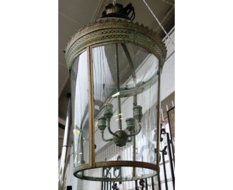A Georgian style green and gilt patinated metal lantern, modern, of domed circular tapering form, with a foliate pierced band