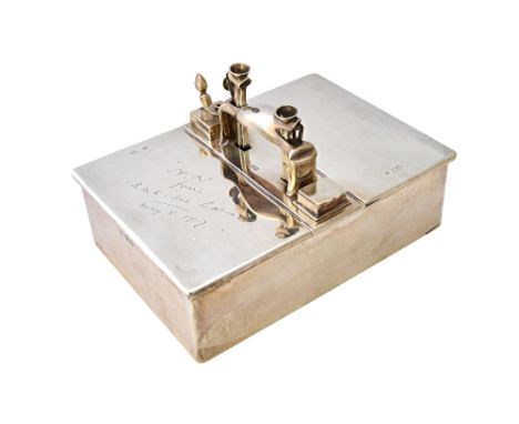 A silver rectangular twin compartment hinge lidded cigar box, fitted with a central carrying handle, with two silver mounted 