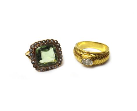 A Swedish pale green paste and seed pearl ring, mounted with the cushion shaped pale green paste within a surround of seed pe