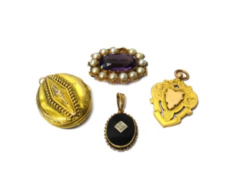 A gold, amethyst and half pearl set oval slide, mounted with a cushion shaped amethyst at the centre, within a surround of se