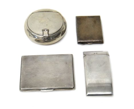 Silver, comprising; a circular hinge lidded tobacco box, Birmingham 1905, a curved rectangular hinge lidded visiting card cas