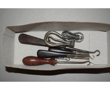 Small box containing a quantity of button hooks
