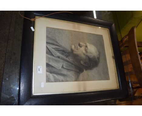 Monochrome portrait print of a gentleman, framed and glazed