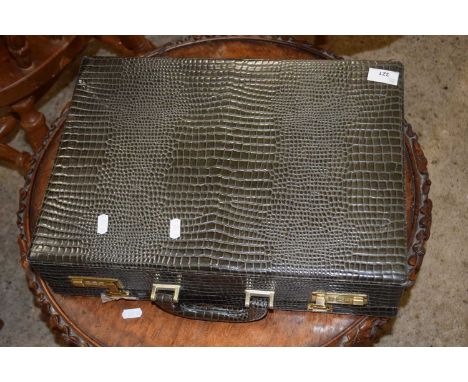 A faux crocodile skin briefcase by John Bennett, London