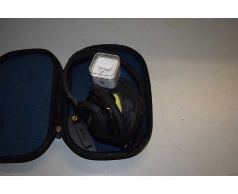 Vintage Bose headphones together with two iPods