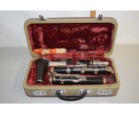 A clarinet in wooden case