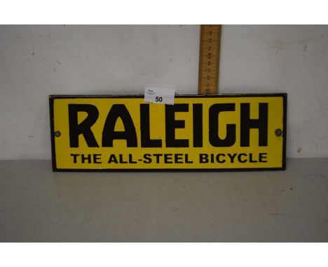 A small rectangular metal advertising plaque for Raleigh Bicycles