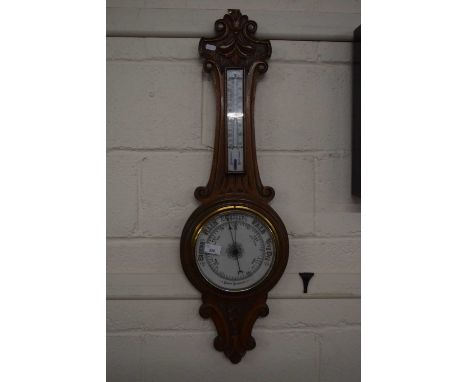 A late Victorian aneroid barometer and thermometer combination