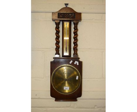 Early 20th Century aneroid barometer and thermometer combination in barley twist oak case