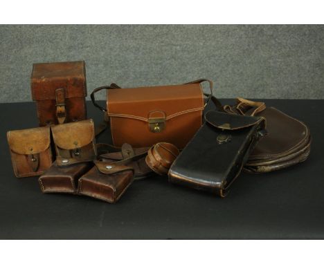 A collection of seven tan and brown leather vintage bags and cases. H.23 W.13 D.13cm. (largest) 