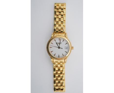 A ladies 18ct yellow gold Longines quartz watch with Longines articulated bracelet. White enamel dial with calendar. Stamped 
