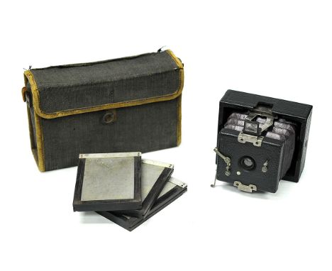 An Un-Marked Folding Strut Camera, with three DDS in maker's case