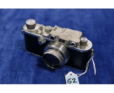 A Leica IIIb Rangefinder Camera, chrome, serial no. 317464, with Leitz Summar f/2 50mm lens, in case