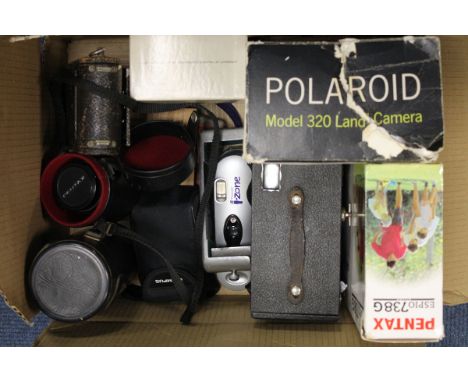 Photographic Items: a Polaroid 320 camera, an f/2.8 28mm SMC Pentax-M Lens with other items (a lot)