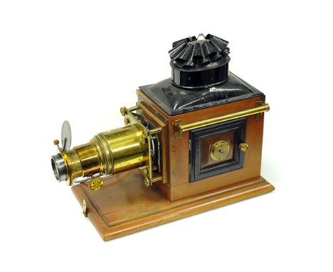 A Mahogany & Brass Magic Lantern, converted to electric, CONTAINS ASBESTOS