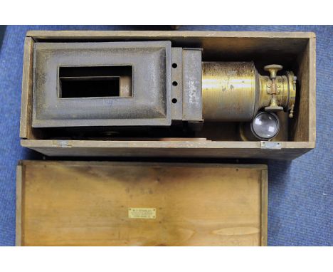 A Magic Lantern, in wood box with retailers plate W F Stanley London Bridge