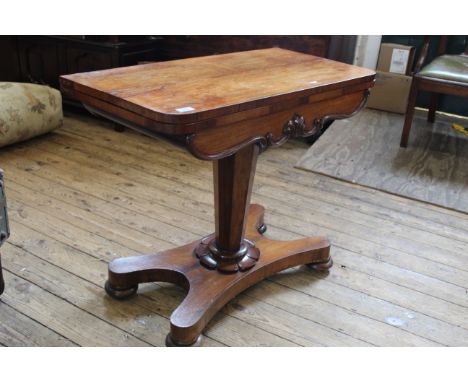 An early Victorian rosewood card table