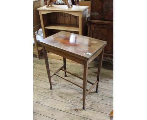 An Edwardian inlaid mahogany small card table