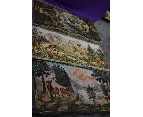An interesting collection of vintage and antique tapestry hangings and sections,also some cut down sections from rugs.