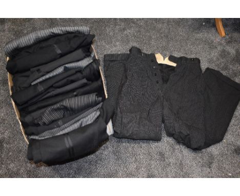 A box full of gents vintage trousers a lot having button fly varied sizes around 1930s onwards.