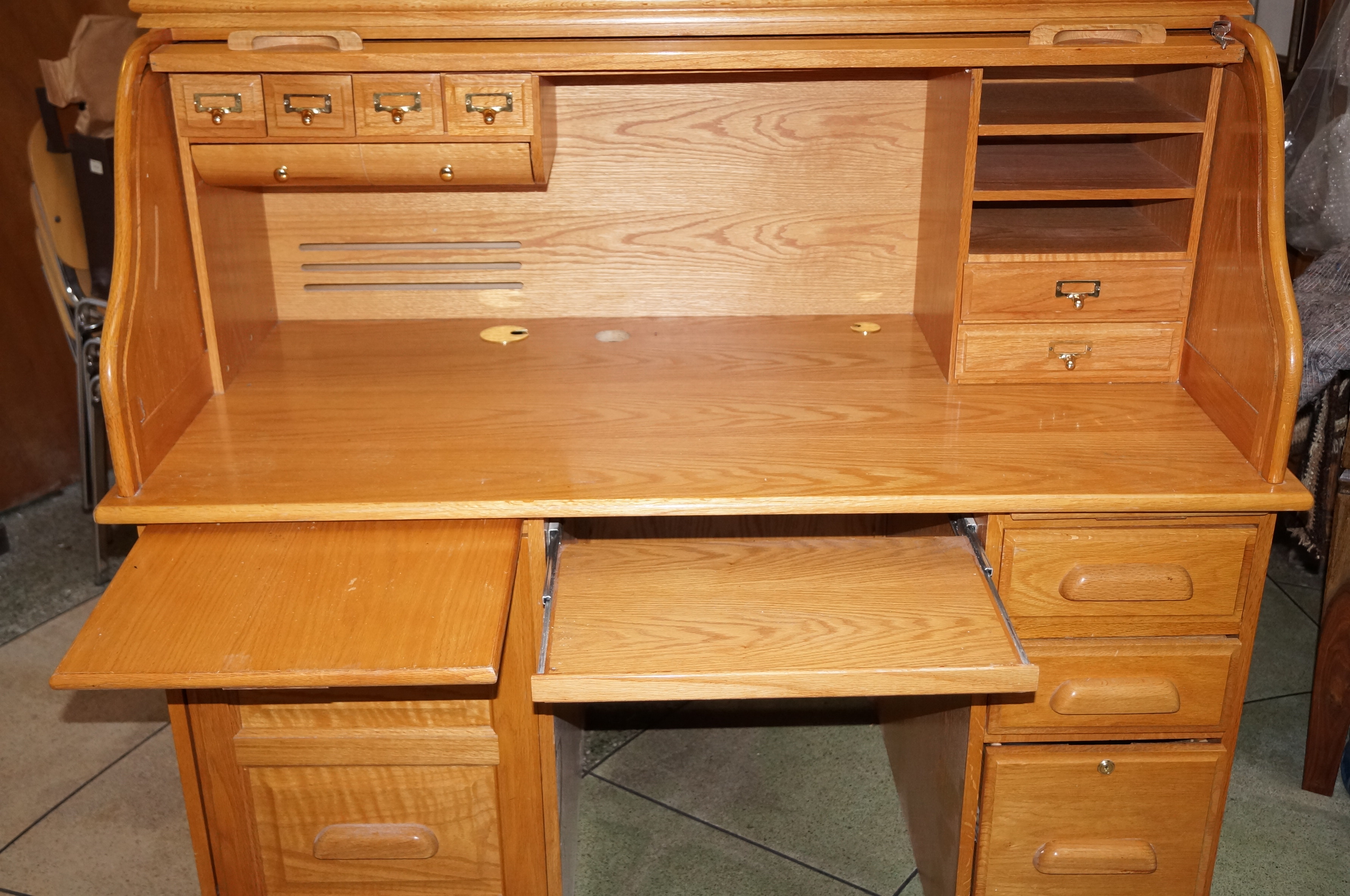 Golden oak roll top desk by Whalen furniture very good quality