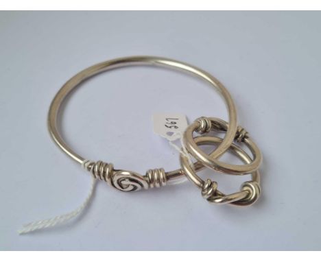 A silver bangle   58 gms