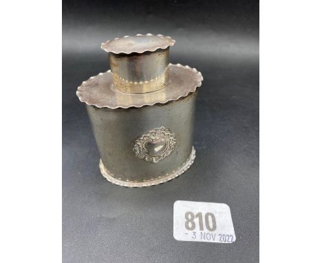 Oval tea caddy with pull off cover, Crimped edge. London 1907