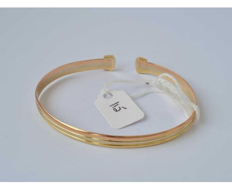A three colour gold bangle 14ct gold    10.7 gms