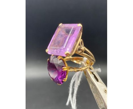 A 18ct gold synthetic Alexandrite ring size K and amethyst ring 9ct size Q     