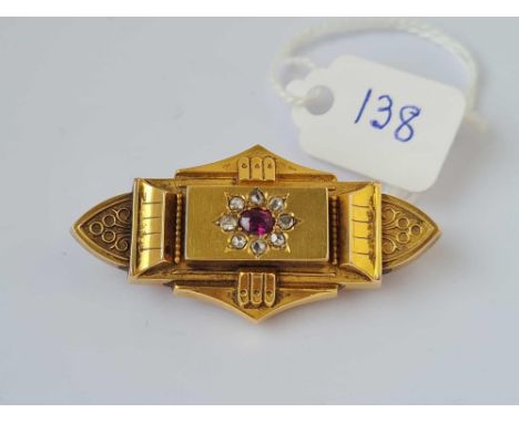 A brooch with ruby and diamonds 15ct gold   6.4 gms