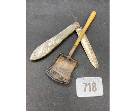 An attractive fruit knife with carved M.O.P and an unmarked caddy spoon with shovel bowl