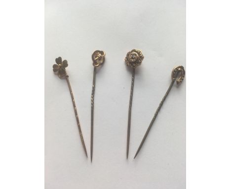 Four 15ct gold stick pins 4.8g