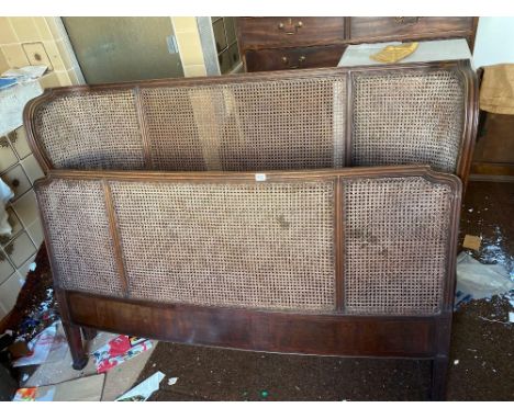 A pair of mahogany and cane panel bed ends, 5ft wide
