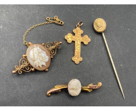 An antique 9ct cross, 2 gold cameo brooches and a cameo stick pin