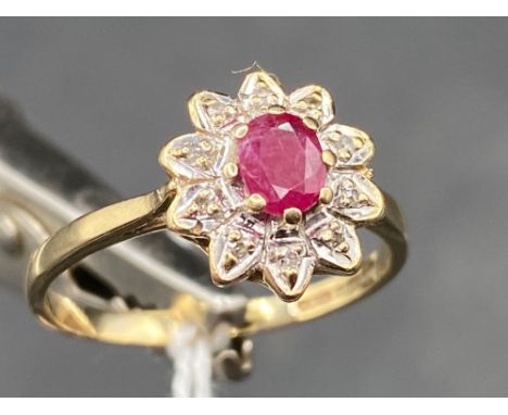 Ruby &amp; diamond flower head ring in 9ct size Q 2.6g inc