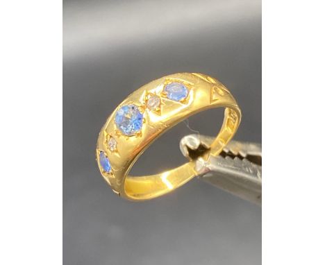 A diamond &amp; sapphire 18ct gold gypsy ring size K 2.8g inc