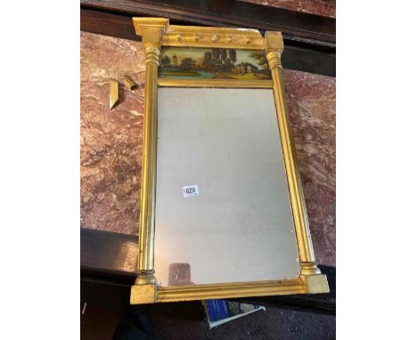 A small regency gilt framed mirror with a painted panel on glass, 25" high