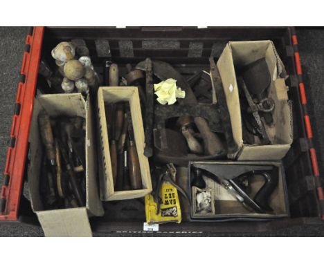 A quantity of tools to include chisels and a plane