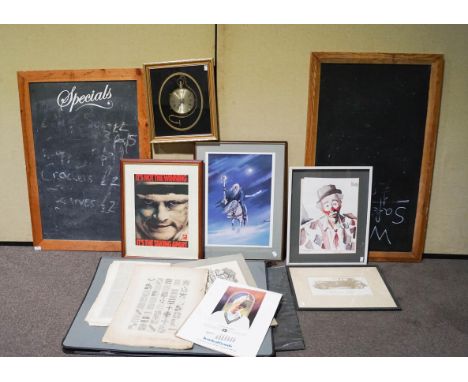 A framed quartz clock, two blackboards and various prints together with a large portfolio
