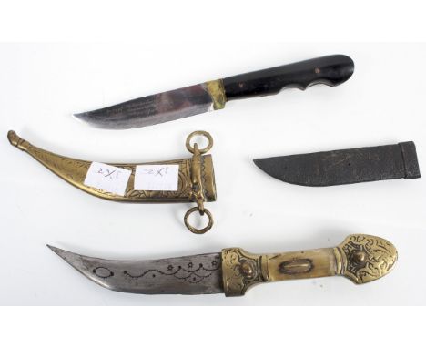 A brass dagger and another dagger in leather scabbard inscribed Innox