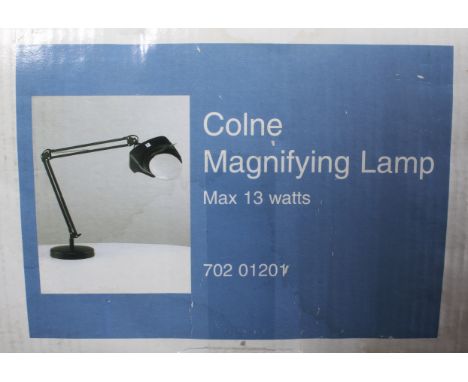 A boxed, John Lewis new "Colne" magnifying lamp