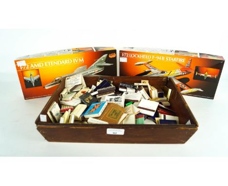 Two model aircraft and a collection of matches