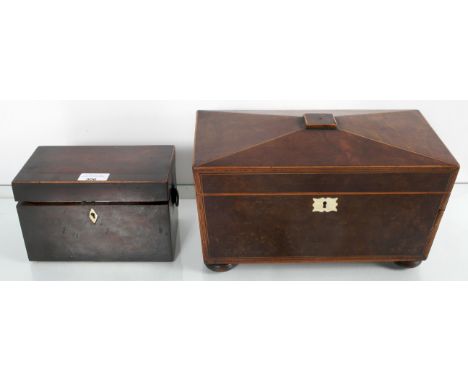 A mahogany sarcophagus shaped tea caddy with satinwood stringing and another smaller tea caddy. Largest measures 17cm high, 3
