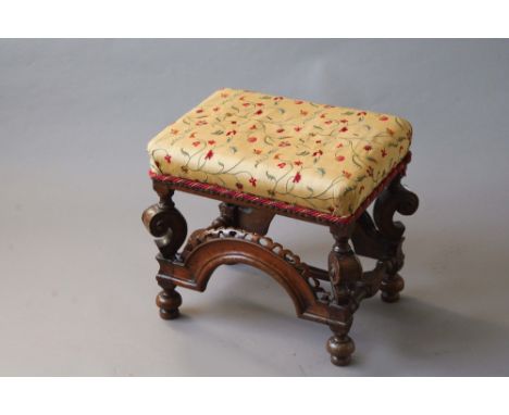 A 17TH CENTURY WALNUT STOOL boldly scrolled frame,  19 1/2ins. (49.5cms) wide