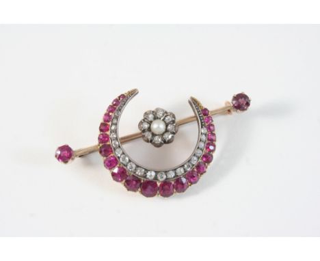 A VICTORIAN RUBY, DIAMOND AND PEARL CRESCENT BROOCH set with oval-shaped rubies and rose-cut diamonds, the diamond set flower